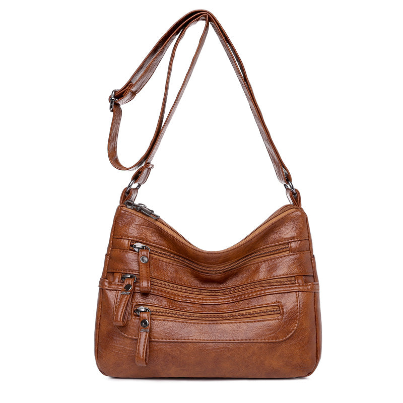 🔥【50% de descuento】Nuevo bolso bandolera de piel lavada de gran capacidad para mujer