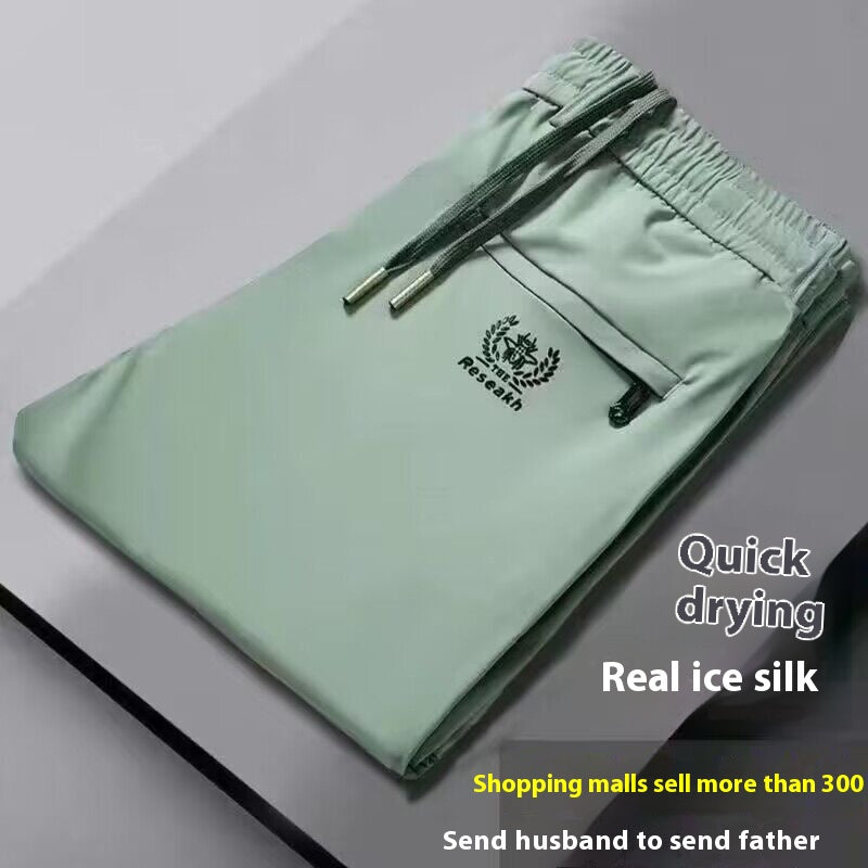 š„š§šćM-5XLćPantalones finos de seda helada para hombre, ideales para el verano. El tejido es suave, cómodo, transpirable y de secado rĆ”pido.