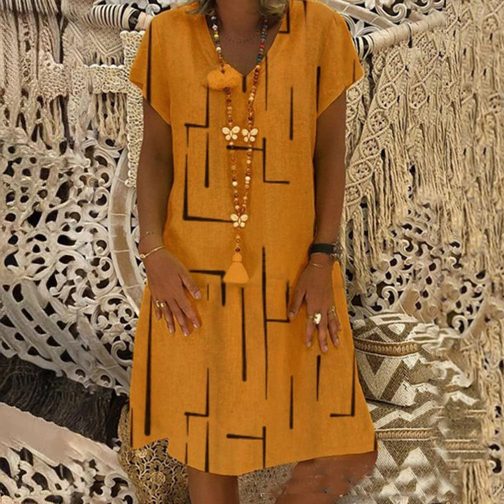 👗【Sezonsko znižanje】【S–5XL】Ženska bombažna obleka z V-izrezom – udobna in elegantna – Znižana cena