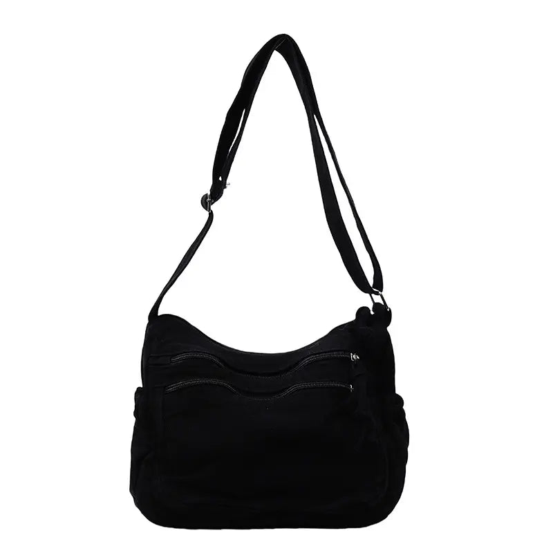 👜✨Veľkokapacitná taška cez rameno z ošúchaného plátna: dizajn s viacerými priehradkami na zips a širokým nastaviteľným ramenným popruhom.