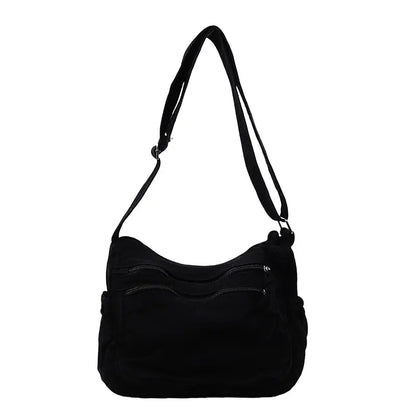 👜✨Veľkokapacitná taška cez rameno z ošúchaného plátna: dizajn s viacerými priehradkami na zips a širokým nastaviteľným ramenným popruhom.