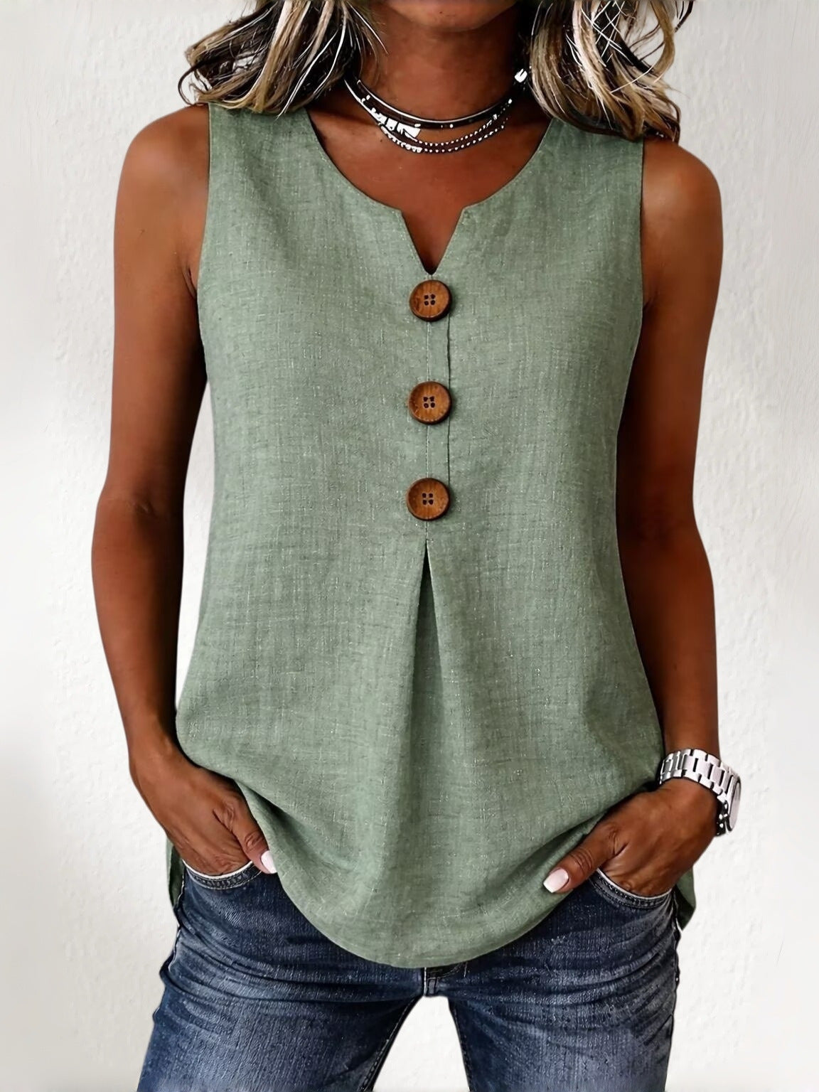 【Oferta al 50%】Nueva blusa sin mangas para mujer 2026, cuello en V y botones lisos.