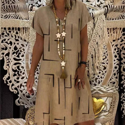 👗【Sezonsko znižanje】【S–5XL】Ženska bombažna obleka z V-izrezom – udobna in elegantna – Znižana cena