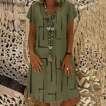 👗【Sezonsko znižanje】【S–5XL】Ženska bombažna obleka z V-izrezom – udobna in elegantna – Znižana cena