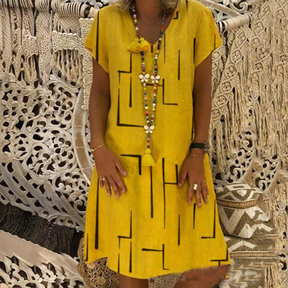 👗【Sezonsko znižanje】【S–5XL】Ženska bombažna obleka z V-izrezom – udobna in elegantna – Znižana cena