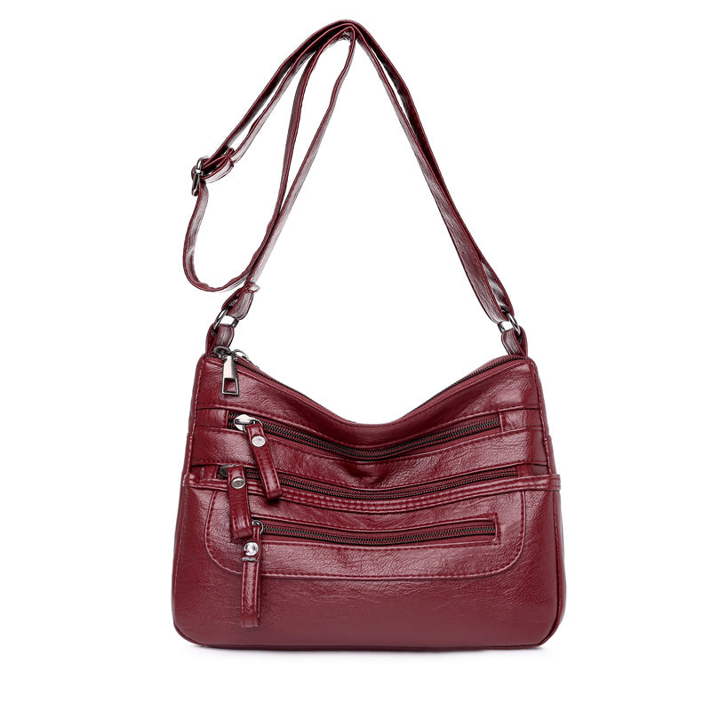 🔥【50% de descuento】Nuevo bolso bandolera de piel lavada de gran capacidad para mujer