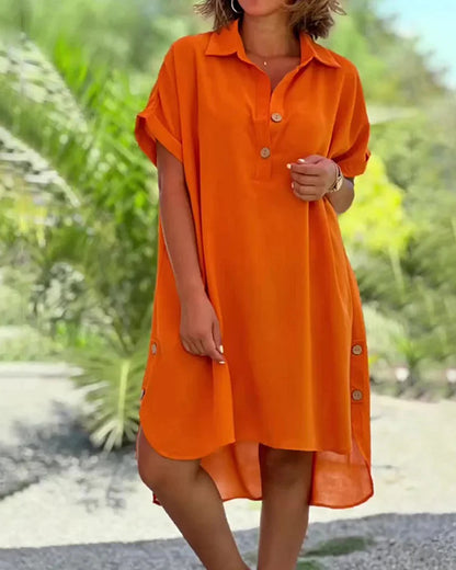 💃🧡【Popust 50% 🔥】【S–5XL】Nova jednobojna ležerna duga haljina za žene s ovratnikom, gumbima i asimetričnim krojem