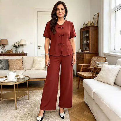 🔥【Oferta limitada al 50%】🔥Conjunto casual y elegante para mujer de tejido ligero, con botones decorativos y pantalón vaporoso