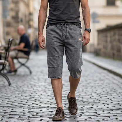 🔥【50% de descuento!】🔥Pantalones cortos vaqueros tres cuartos para hombre, jeans ligeros y frescos de verano, cintura elástica con cordón, corte oversize holgado, material suave y transpirable.