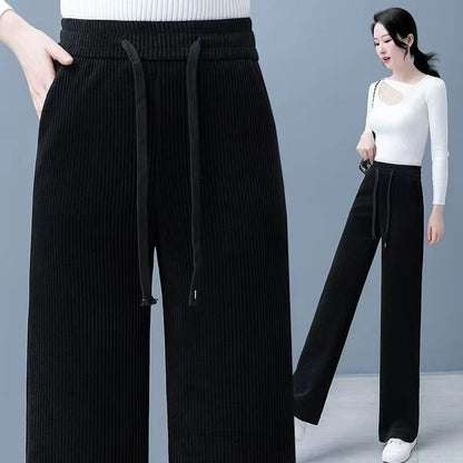 🔥【Compre uno y llévese otro gratis】 👖Nuevos pantalones casuales de terciopelo con perneras anchas, muy cómodos de usar.