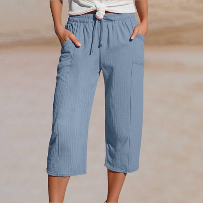 🔥✨【50% zniżki】Nowe letnie damskie spodnie capri z plisami, wykonane z bawełny i lnu, w jednolitym kolorze