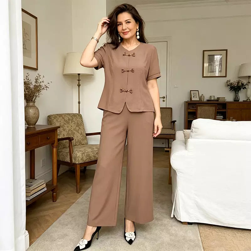 🔥【Oferta limitada al 50%】🔥Conjunto casual y elegante para mujer de tejido ligero, con botones decorativos y pantalón vaporoso