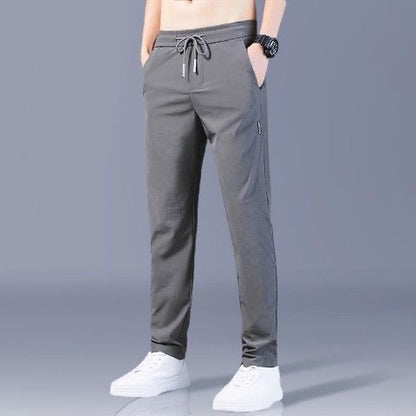 【🔥50% zniżki】👖【M-5XL】Letnie cienkie męskie spodnie casualowe, rozciągliwe, koreański styl, modny luźny, prosty krój