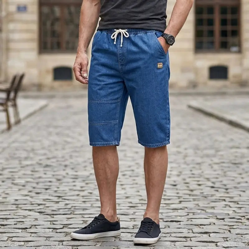 🔥【50% de descuento!】🔥Pantalones cortos vaqueros tres cuartos para hombre, jeans ligeros y frescos de verano, cintura elástica con cordón, corte oversize holgado, material suave y transpirable.