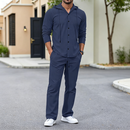 🔥【50% descuento】👕👕【S-3XL】Nuevo conjunto hombre 2026 de lino holgado con capucha manga larga (camisa con botones + pantalón)