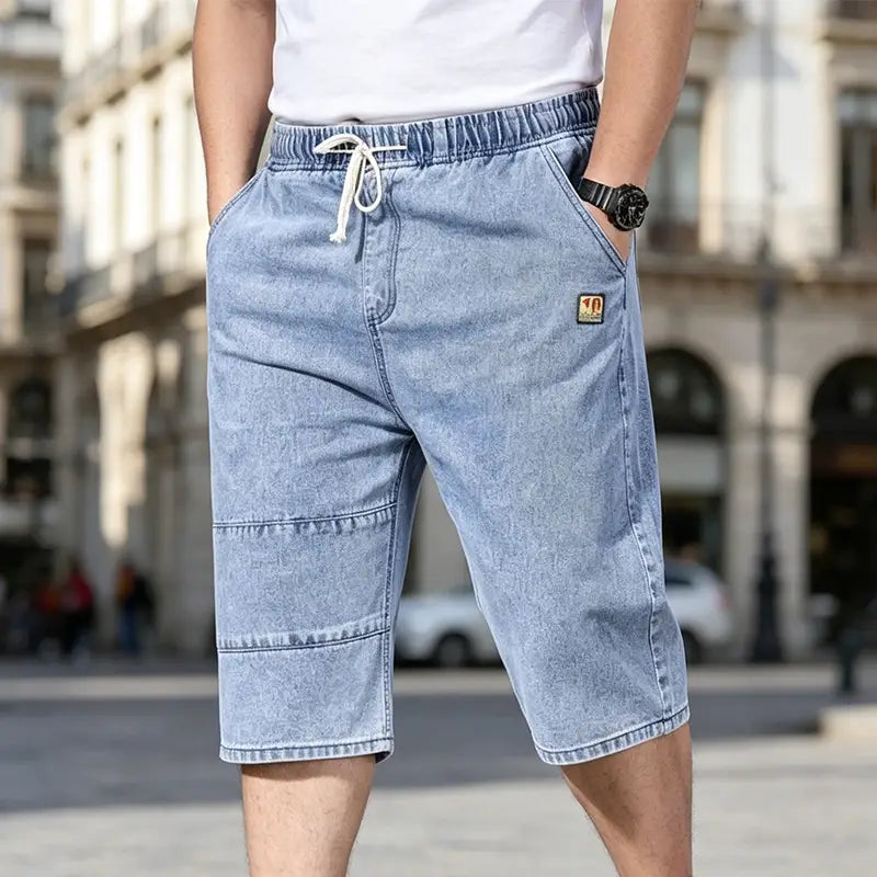 🔥【50% de descuento!】🔥Pantalones cortos vaqueros tres cuartos para hombre, jeans ligeros y frescos de verano, cintura elástica con cordón, corte oversize holgado, material suave y transpirable.