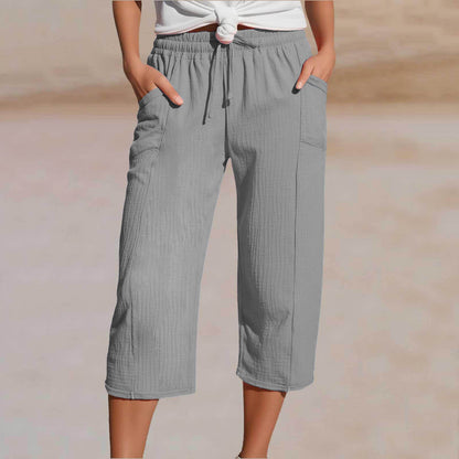 🔥✨【50% zniżki】Nowe letnie damskie spodnie capri z plisami, wykonane z bawełny i lnu, w jednolitym kolorze