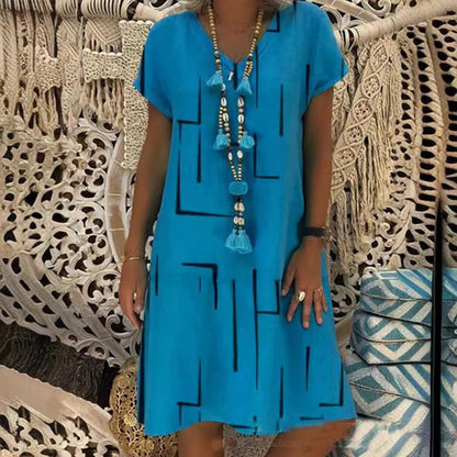 👗【Sezonsko znižanje】【S–5XL】Ženska bombažna obleka z V-izrezom – udobna in elegantna – Znižana cena