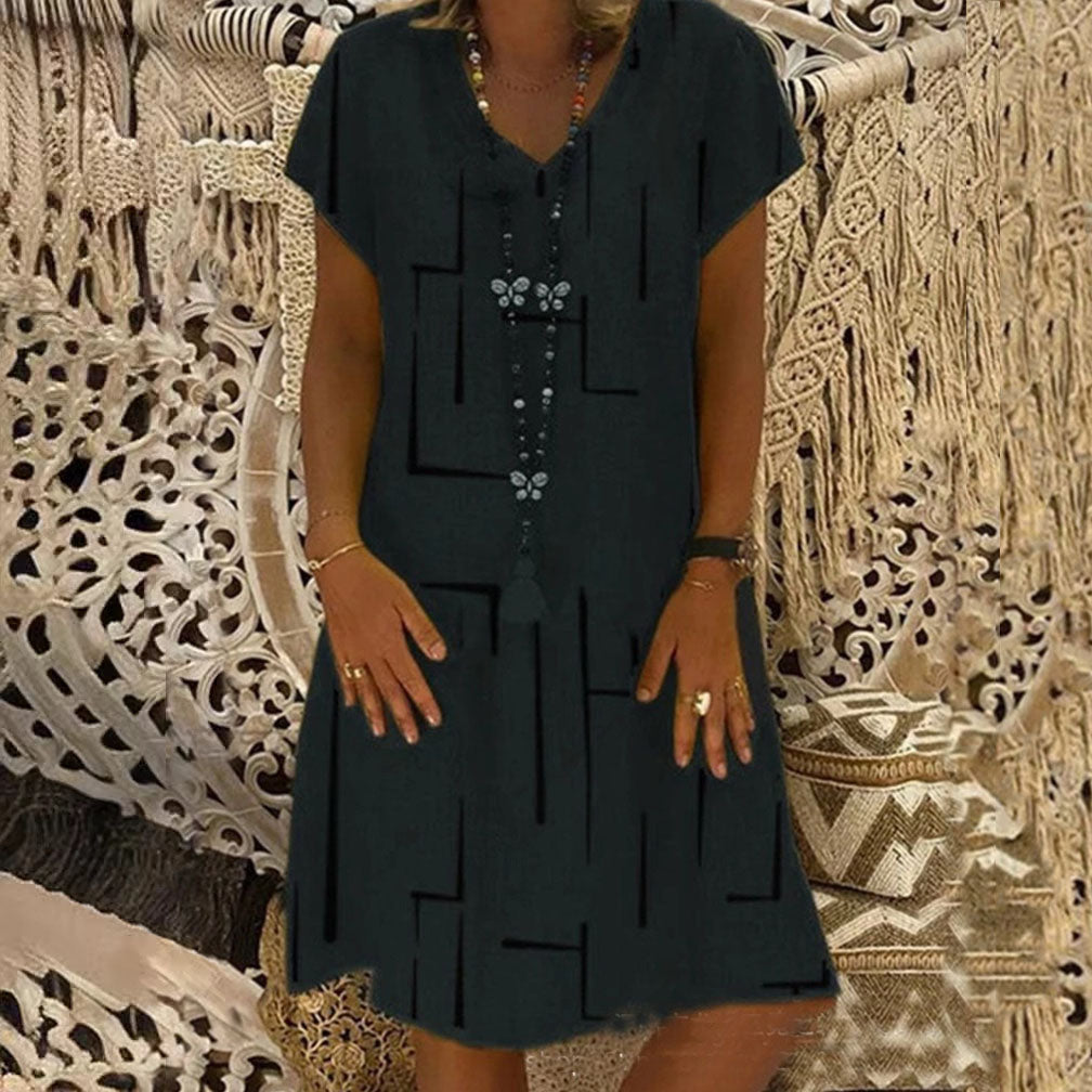 👗【Sezonsko znižanje】【S–5XL】Ženska bombažna obleka z V-izrezom – udobna in elegantna – Znižana cena