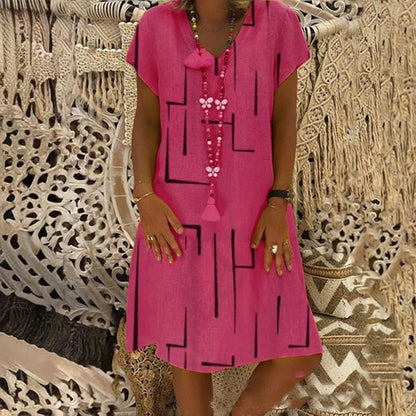 👗【Sezonsko znižanje】【S–5XL】Ženska bombažna obleka z V-izrezom – udobna in elegantna – Znižana cena