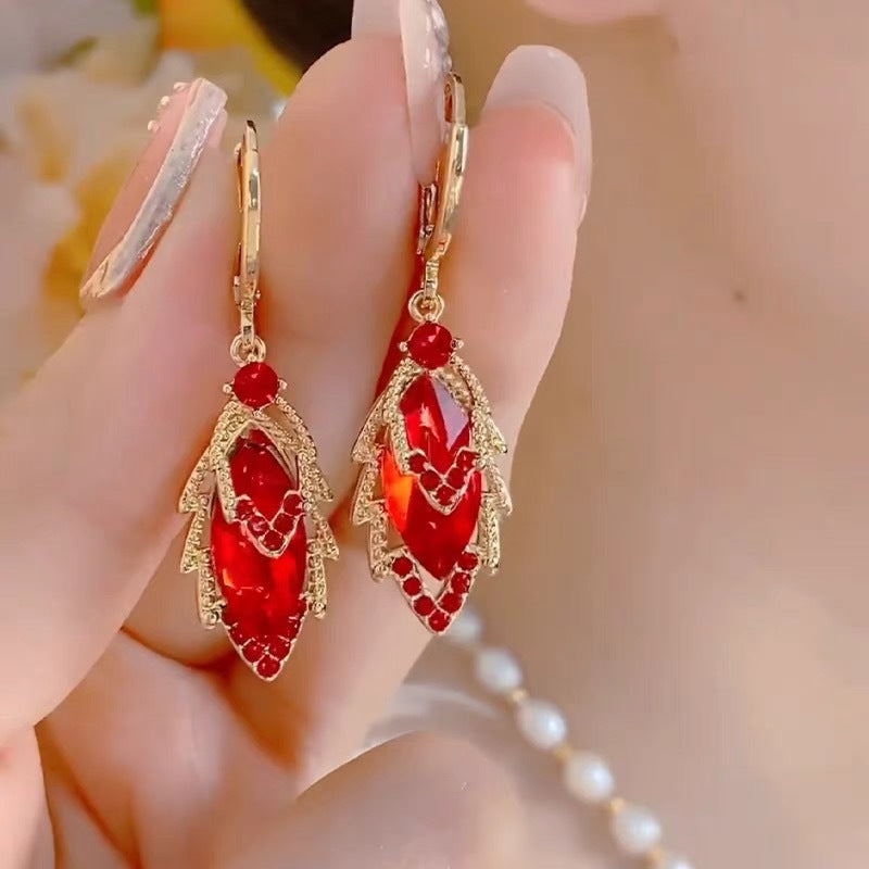 🔥【Kup 1, otrzymaj 1 gratis】💥【Nowy styl 2025】Eleganckie złote kolczyki z błyszczącymi diamentami